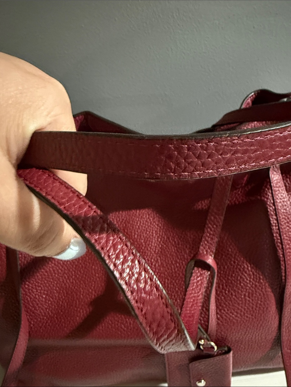 Henri Bendel tote bag features a pebbled texture and gold-toned hardware. - Picture 4 of 11